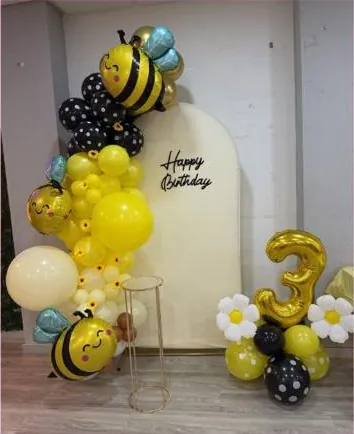Decoración de abejas con globos amarillos